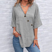 Kiray graceful polished blouse with V-neck and asymmetric button placket in a relaxed fit