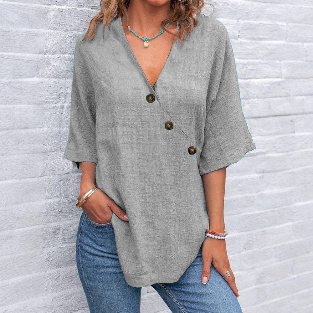 Kiray graceful polished blouse with V-neck and asymmetric button placket in a relaxed fit