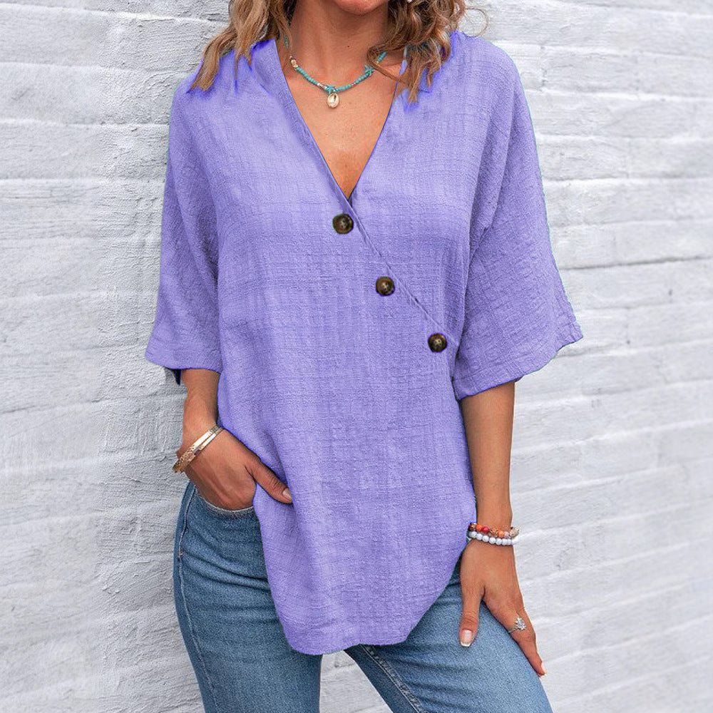 Kiray graceful polished blouse with V-neck and asymmetric button placket in a relaxed fit
