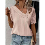 Haifa sophisticated lace blouse with asymmetric neckline and pleated design, shown in white