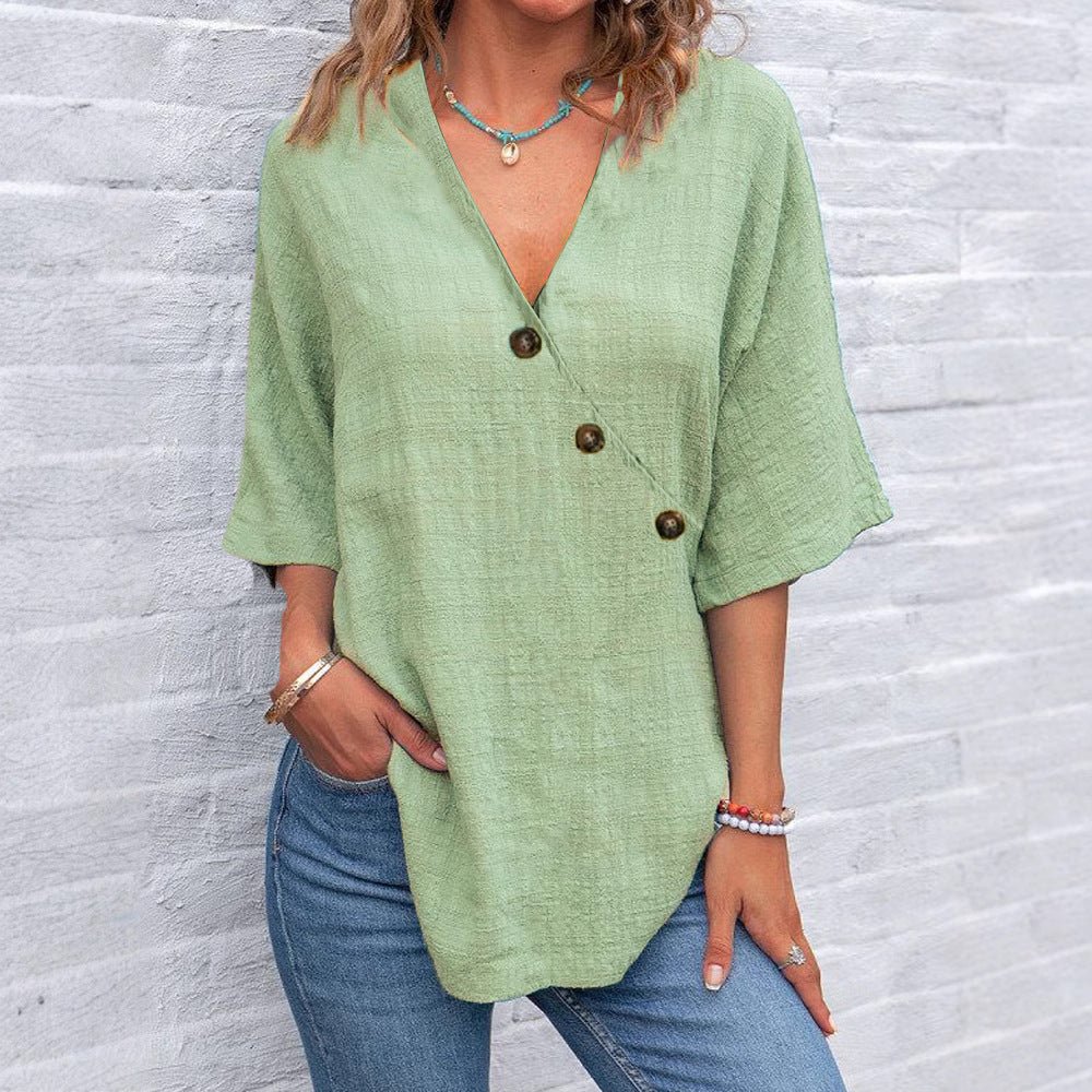 Kiray graceful polished blouse with V-neck and asymmetric button placket in a relaxed fit