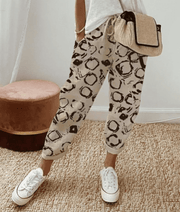 Emelia premium tailored pants shown in a refined, structured silhouette