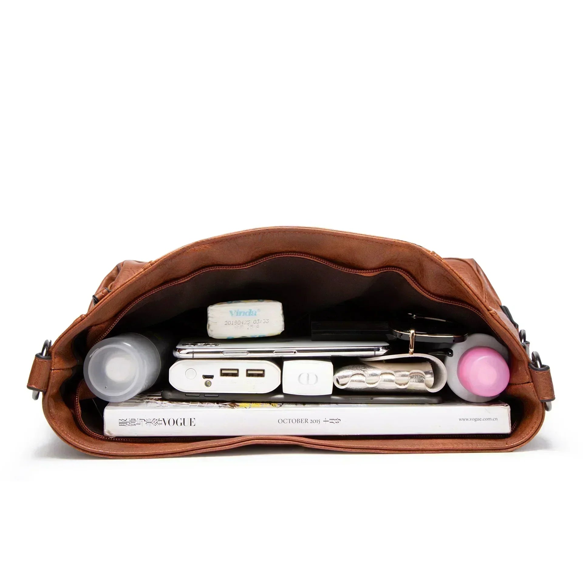 Evening Glow luxe leather shoulder bag shown in a rich neutral colour