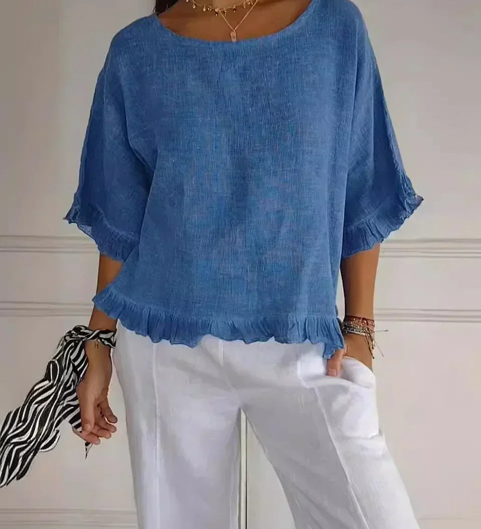 Gemma graceful everyday blouse with softly ruffled sleeves, shown in a soft feminine shade