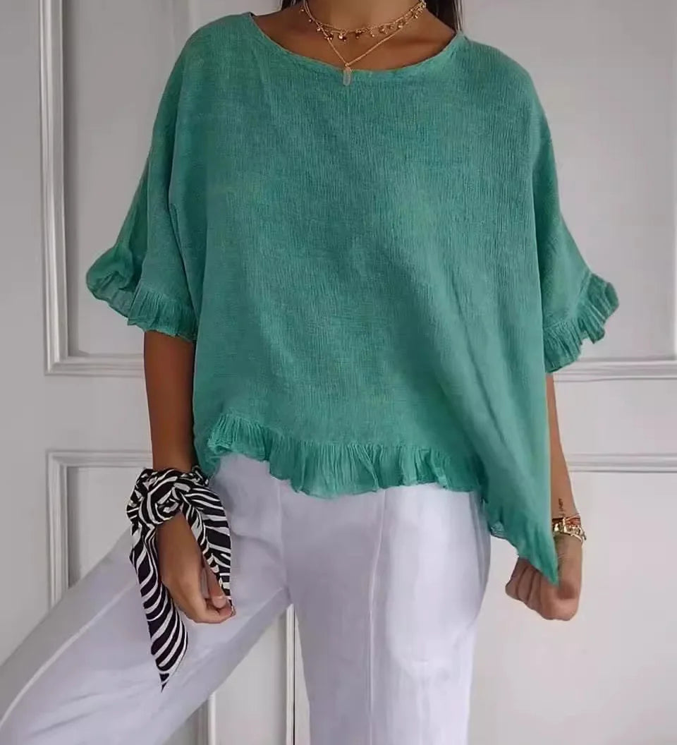 Gemma graceful everyday blouse with softly ruffled sleeves, shown in a soft feminine shade