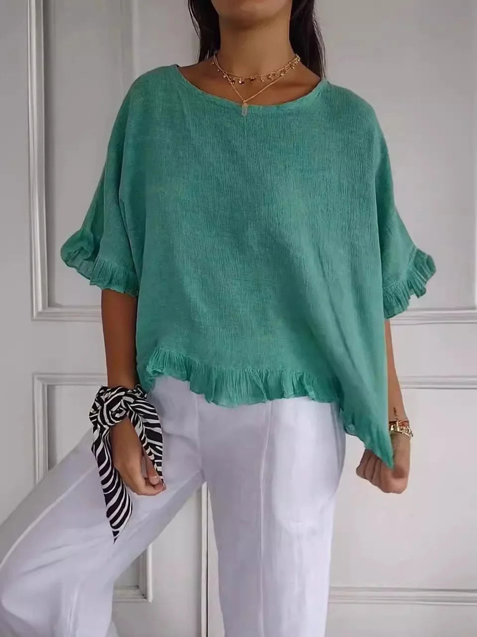 Gemma graceful everyday blouse with softly ruffled sleeves, shown in a soft feminine shade