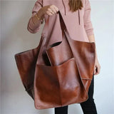 Calia Classic Heritage leather carryall handbag shown in brown