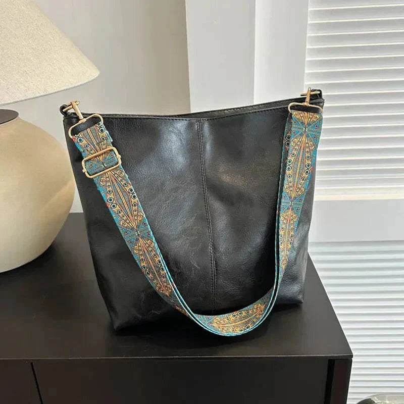 Tyla urban heritage leather shoulder bag with structured silhouette and shoulder strap