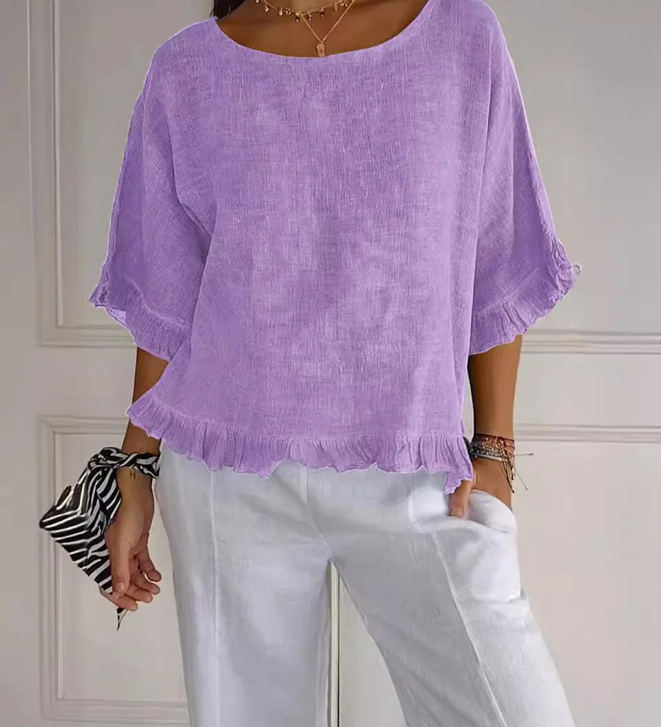 Gemma graceful everyday blouse with softly ruffled sleeves, shown in a soft feminine shade