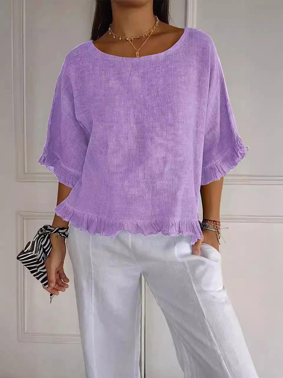 Gemma graceful everyday blouse with softly ruffled sleeves, shown in a soft feminine shade