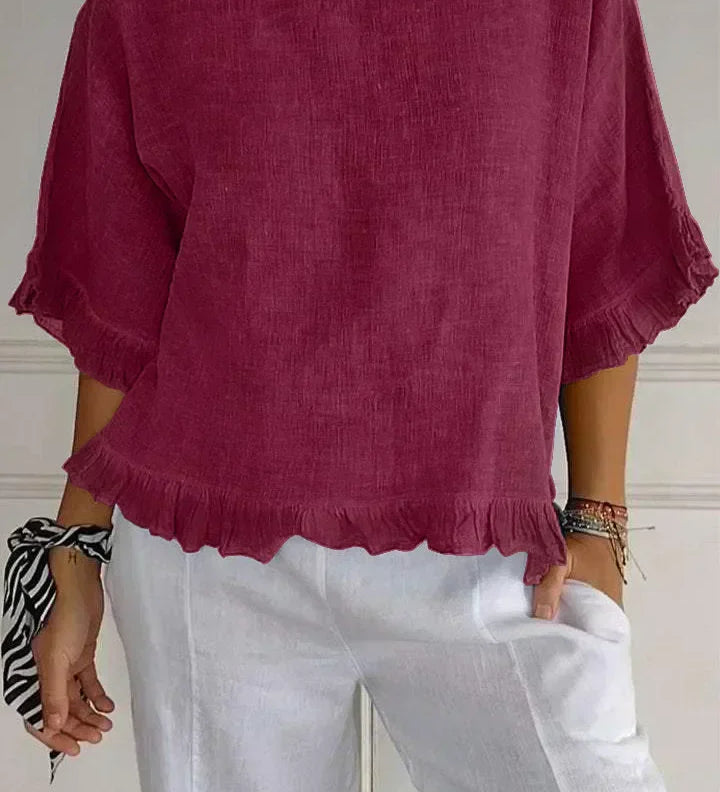 Gemma graceful everyday blouse with softly ruffled sleeves, shown in a soft feminine shade