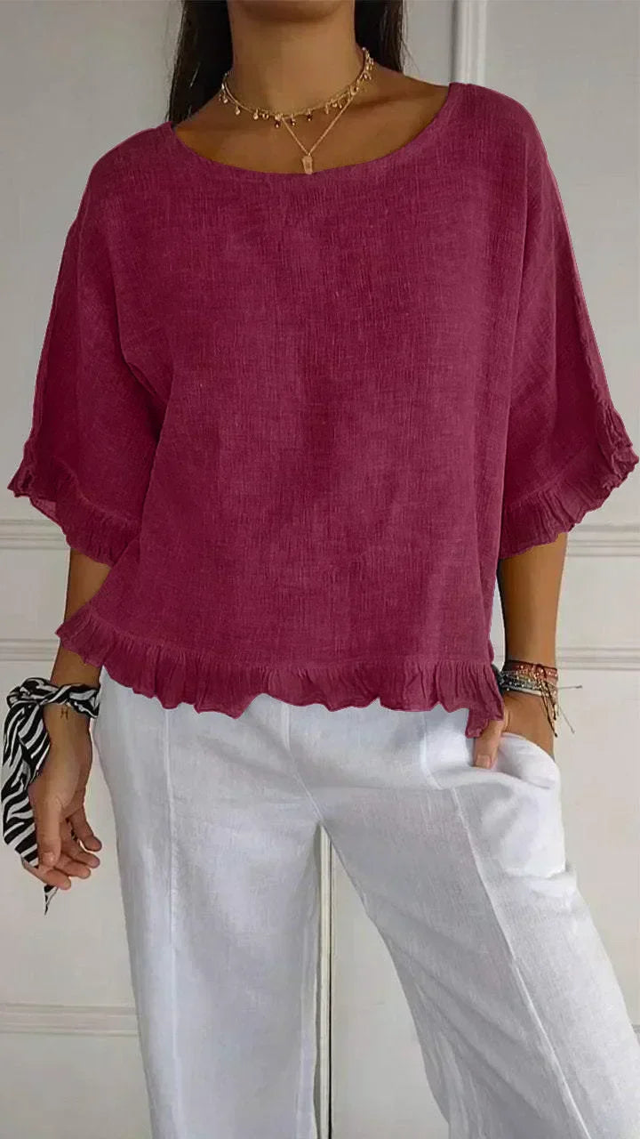 Gemma graceful everyday blouse with softly ruffled sleeves, shown in a soft feminine shade