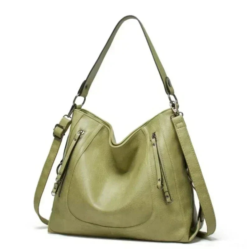 Evening Glow luxe leather shoulder bag shown in a rich neutral colour