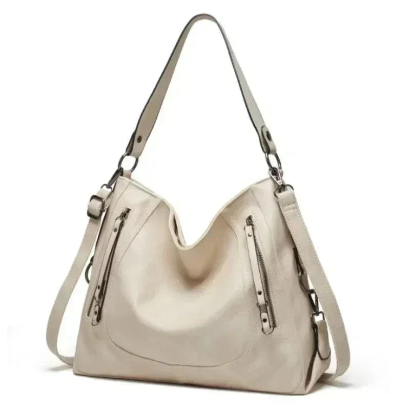 Evening Glow luxe leather shoulder bag shown in a rich neutral colour