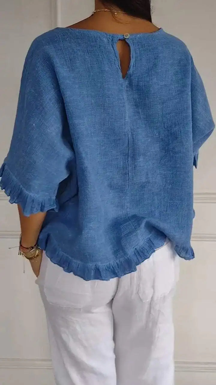 Gemma graceful everyday blouse with softly ruffled sleeves, shown in a soft feminine shade