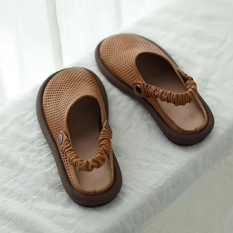 Iya sleek minimalist sandal with a slim strap in a neutral tone