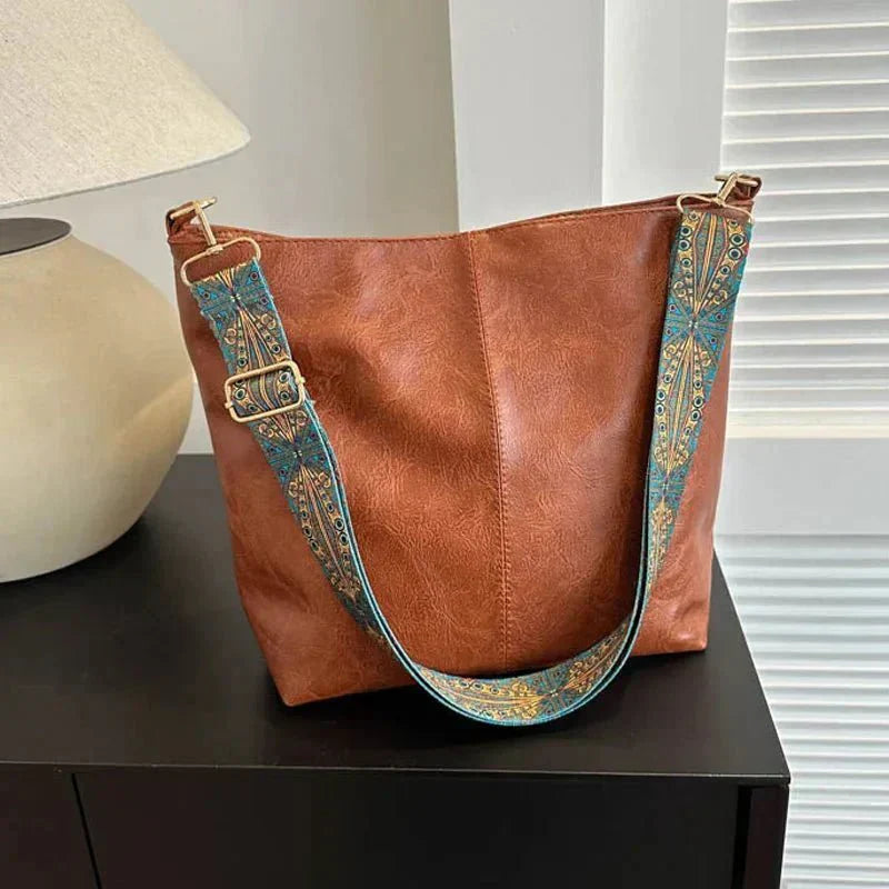 Tyla urban heritage leather shoulder bag with structured silhouette and shoulder strap