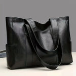 Sophia's Luxe Legacy premium leather handbag shown in Coffee and Black