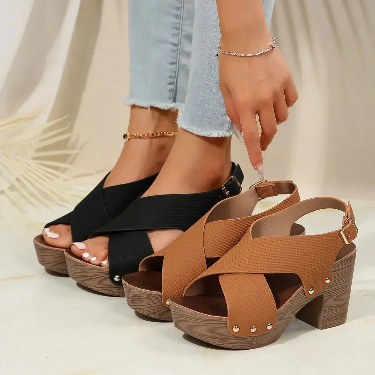 Pula Sunset platform sandals with block heel, crisscross straps and metallic rivet accents