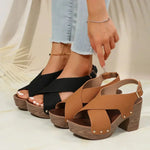 Pula Sunset platform sandals with block heel, crisscross straps and metallic rivet accents