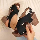 Pula Sunset platform sandals with block heel, crisscross straps and metallic rivet accents