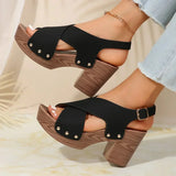 Pula Sunset platform sandals with block heel, crisscross straps and metallic rivet accents