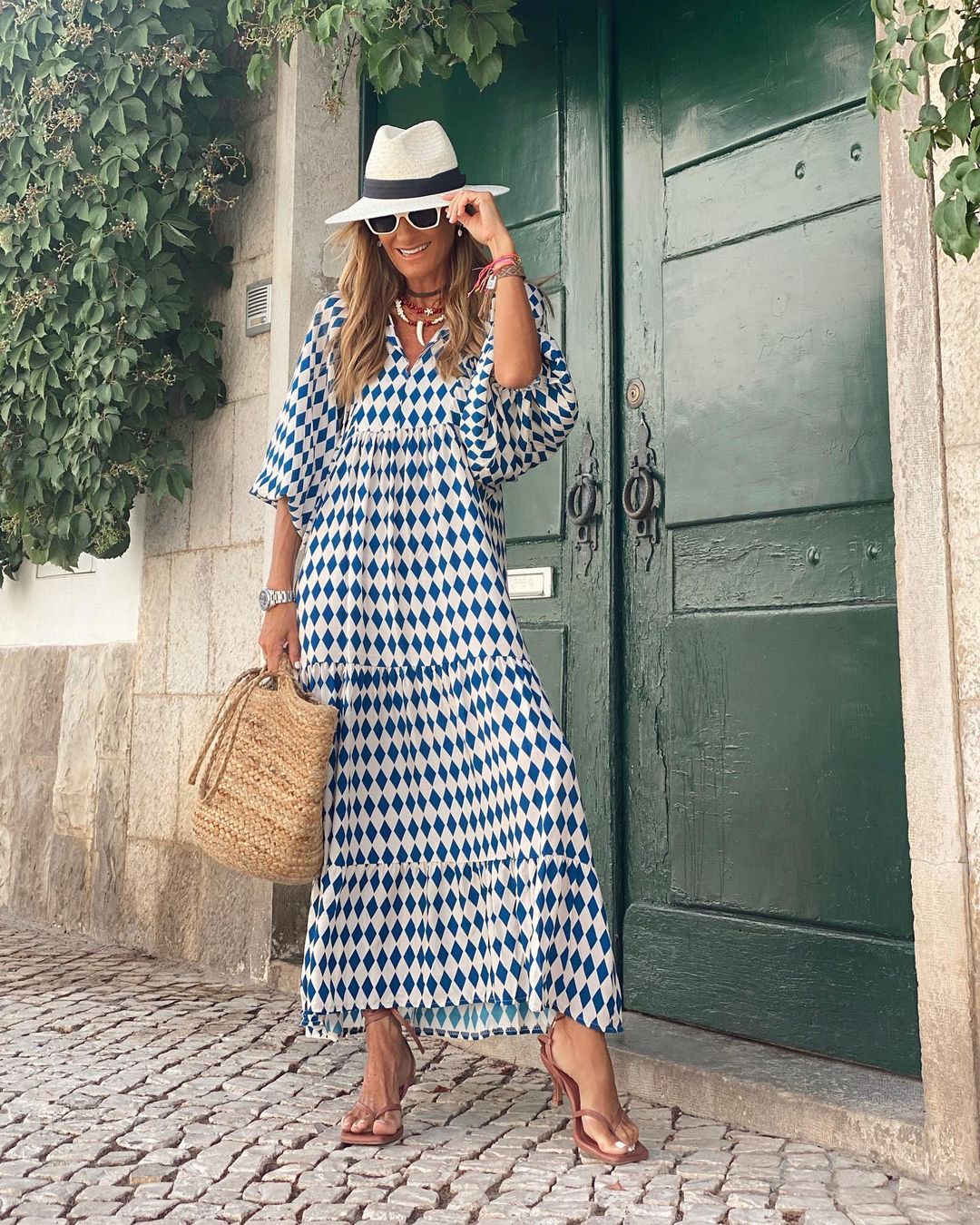 Iwa bohemian long dress with a flowy silhouette and V-neckline