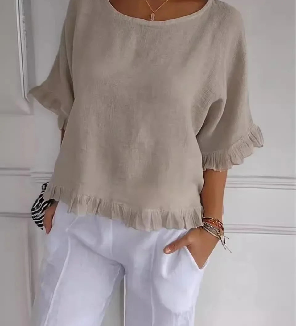 Gemma graceful everyday blouse with softly ruffled sleeves, shown in a soft feminine shade