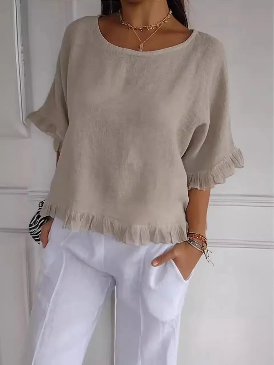 Gemma graceful everyday blouse with softly ruffled sleeves, shown in a soft feminine shade