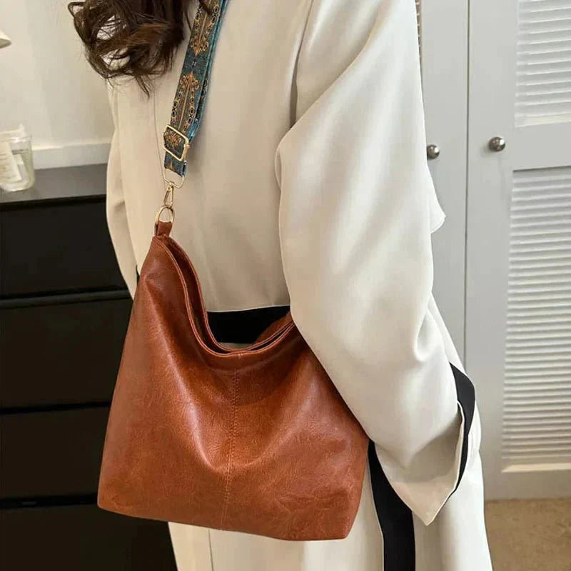 Tyla urban heritage leather shoulder bag with structured silhouette and shoulder strap