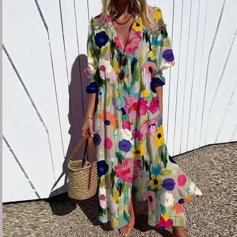 Rema beachcomber boho dress with deep V-neckline and flowing layered skirt