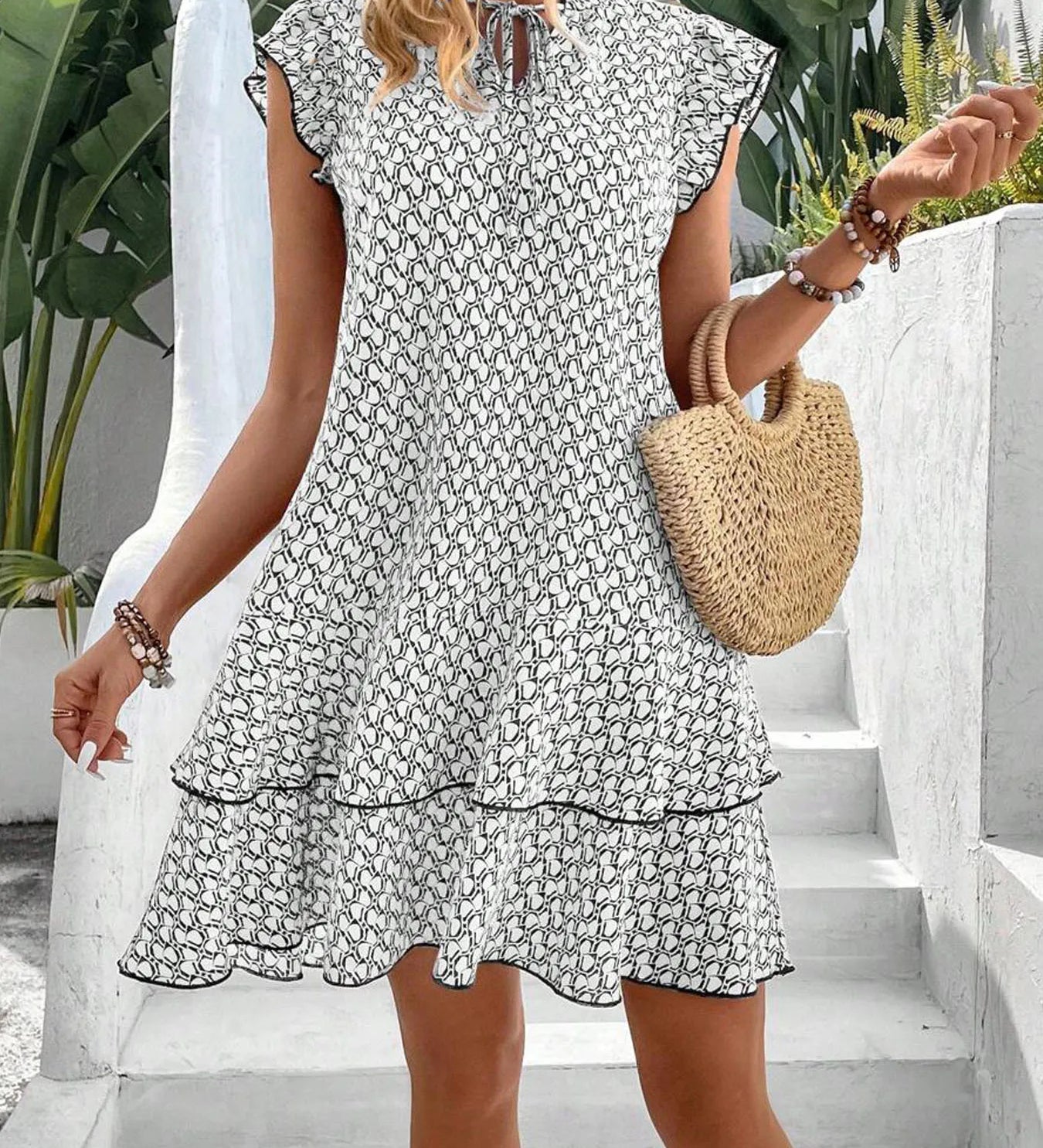Krest elegant floral dress shown in a flattering silhouette, available in khaki, white and red