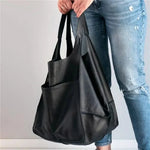 Calia Classic Heritage leather carryall handbag shown in brown