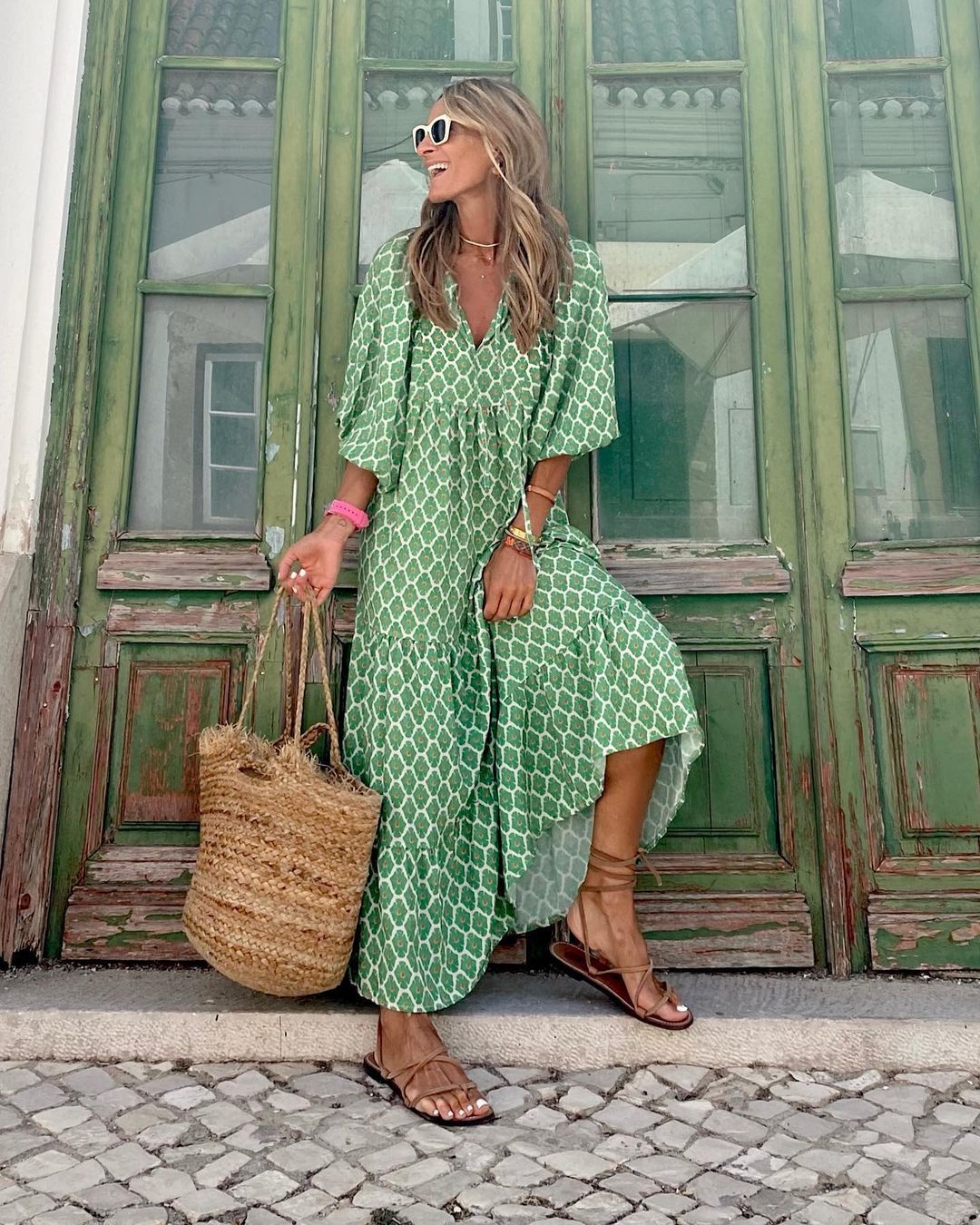 Iwa bohemian long dress with a flowy silhouette and V-neckline