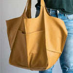 Calia Classic Heritage leather carryall handbag shown in brown