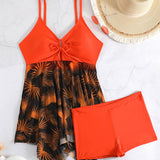 Mitch flattering swimdress set with asymmetric skirt and floral mesh detailing