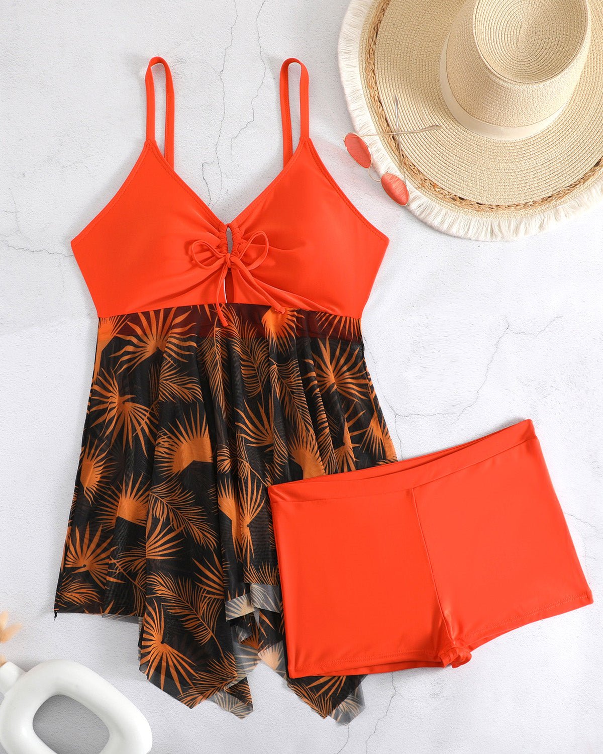 Mitch flattering swimdress set with asymmetric skirt and floral mesh detailing