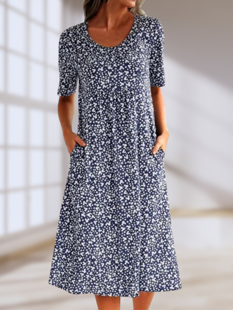 Lilo floral summer dress with mid-length cut and soft crew neckline