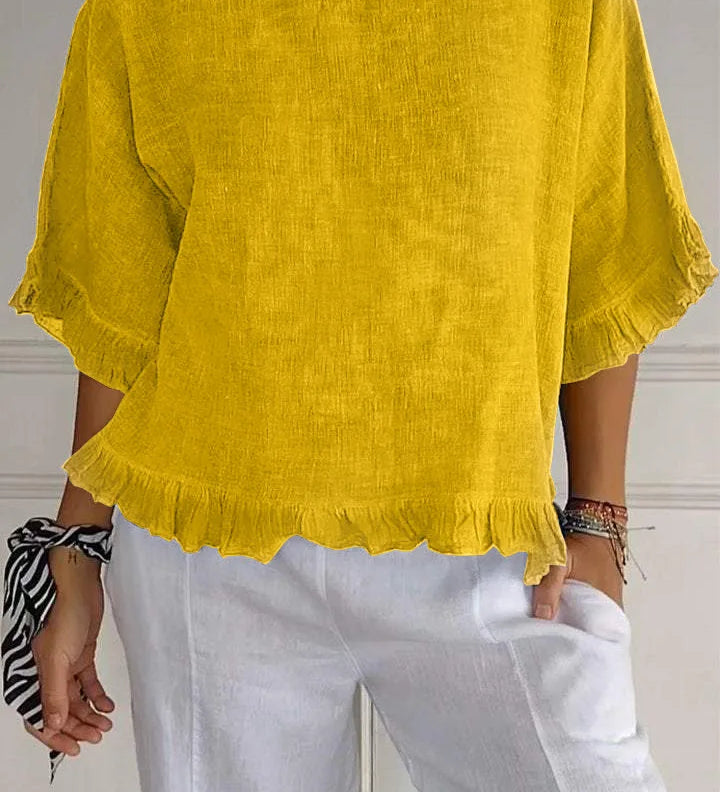Gemma graceful everyday blouse with softly ruffled sleeves, shown in a soft feminine shade