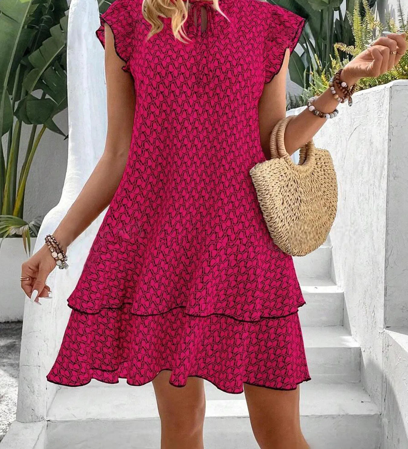 Krest elegant floral dress shown in a flattering silhouette, available in khaki, white and red