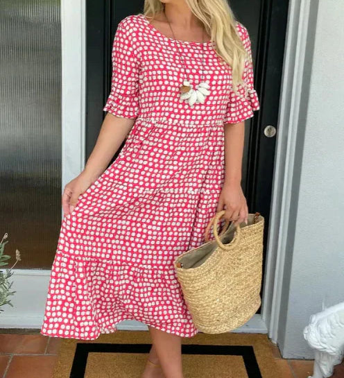 Zora short-sleeve summer midi dress in a relaxed, flowing silhouette