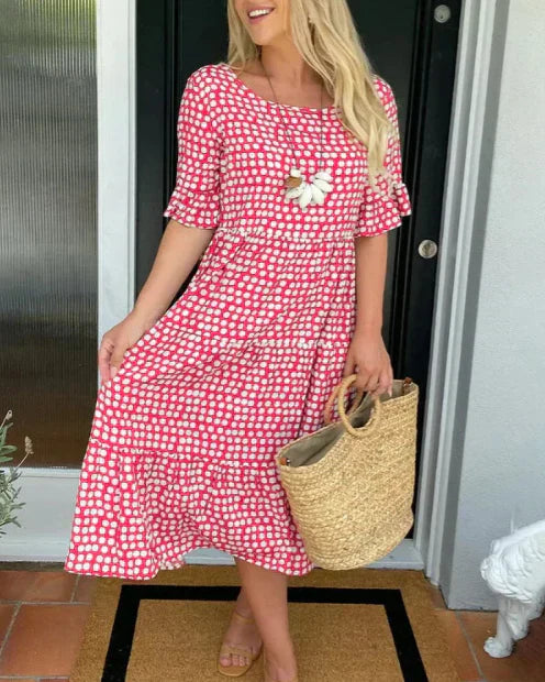 Zora short-sleeve summer midi dress in a relaxed, flowing silhouette