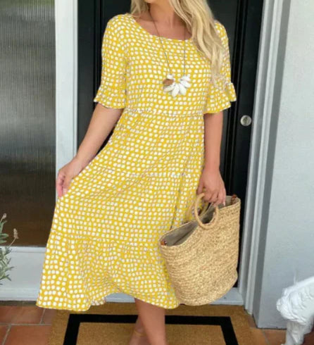 Zora short-sleeve summer midi dress in a relaxed, flowing silhouette
