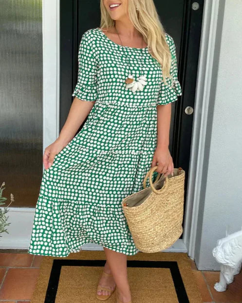 Zora short-sleeve summer midi dress in a relaxed, flowing silhouette