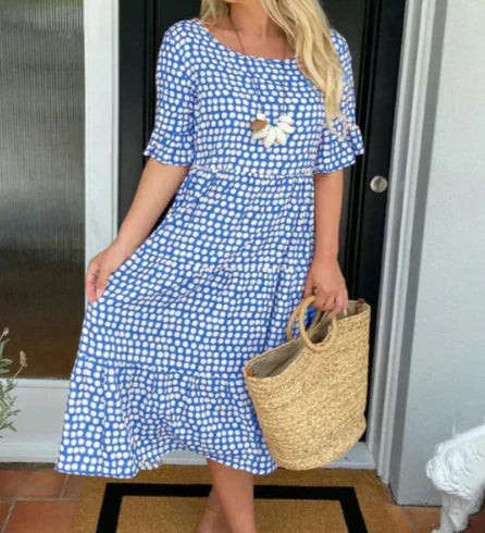 Zora short-sleeve summer midi dress in a relaxed, flowing silhouette