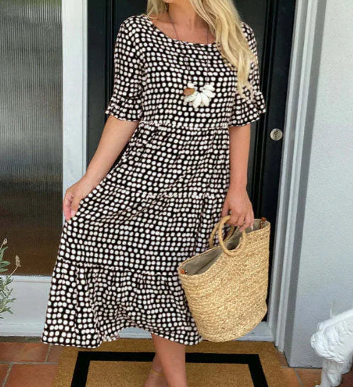 Zora short-sleeve summer midi dress in a relaxed, flowing silhouette