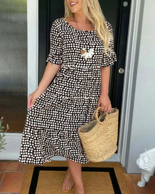 Zora short-sleeve summer midi dress in a relaxed, flowing silhouette