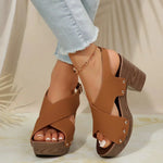 Pula Sunset platform sandals with block heel, crisscross straps and metallic rivet accents