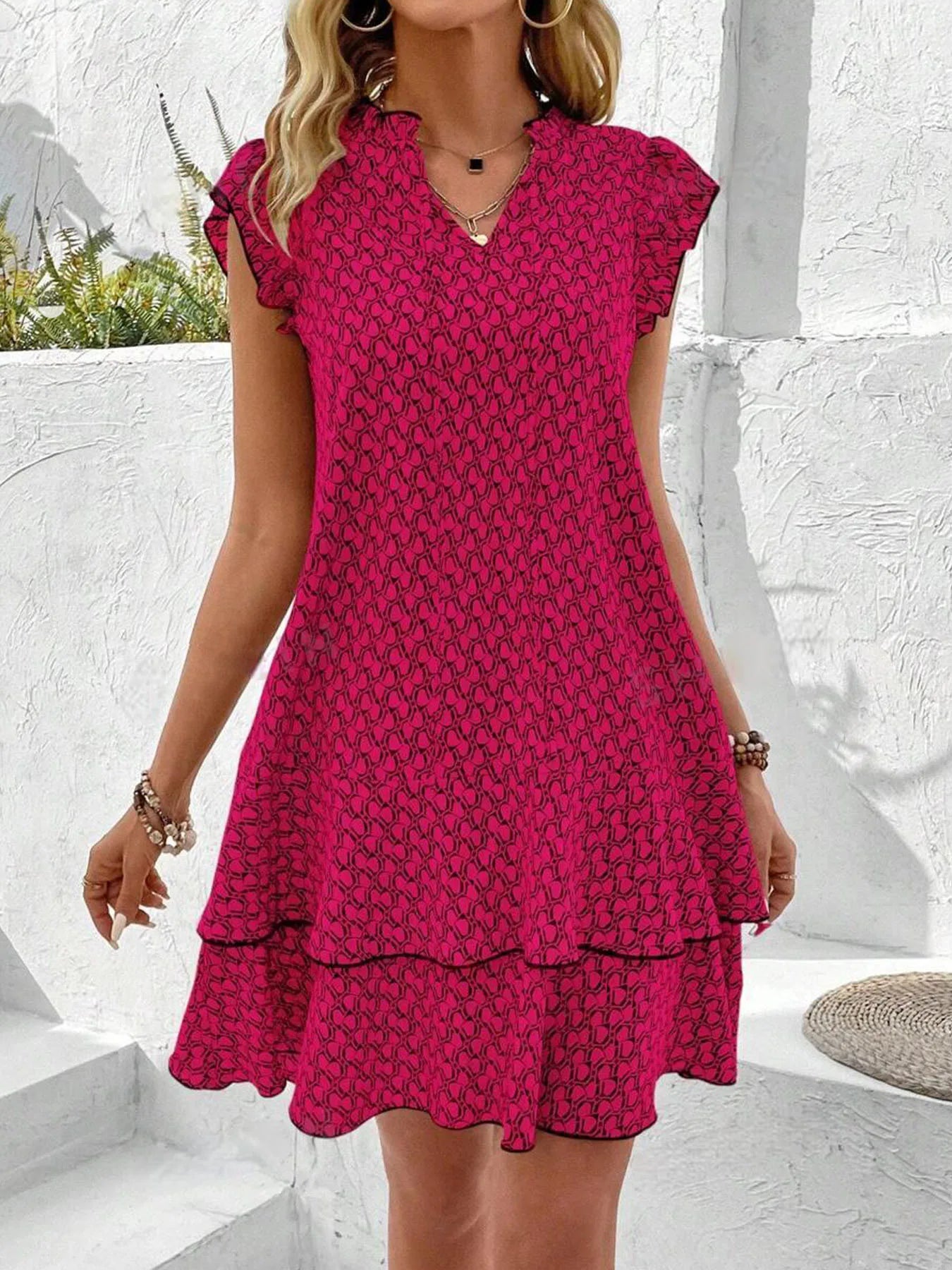 Krest elegant floral dress shown in a flattering silhouette, available in khaki, white and red