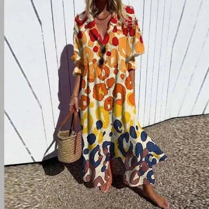 Rimmey Beachcomber boho dress with deep V-neckline and flowing layered skirt